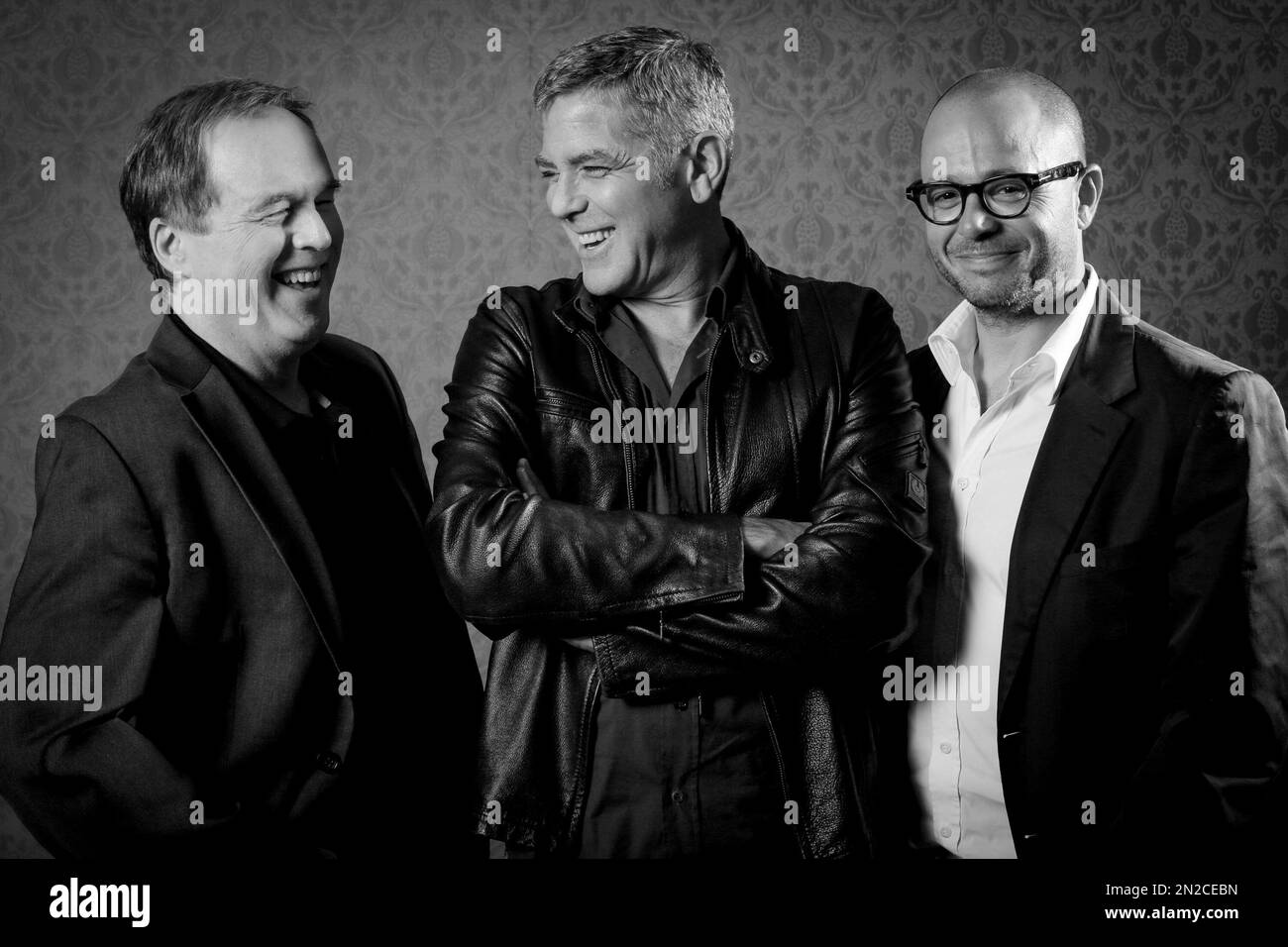 Brad Bird, from left, Clooney and Damon Lindelof pose for a portrait during press day for