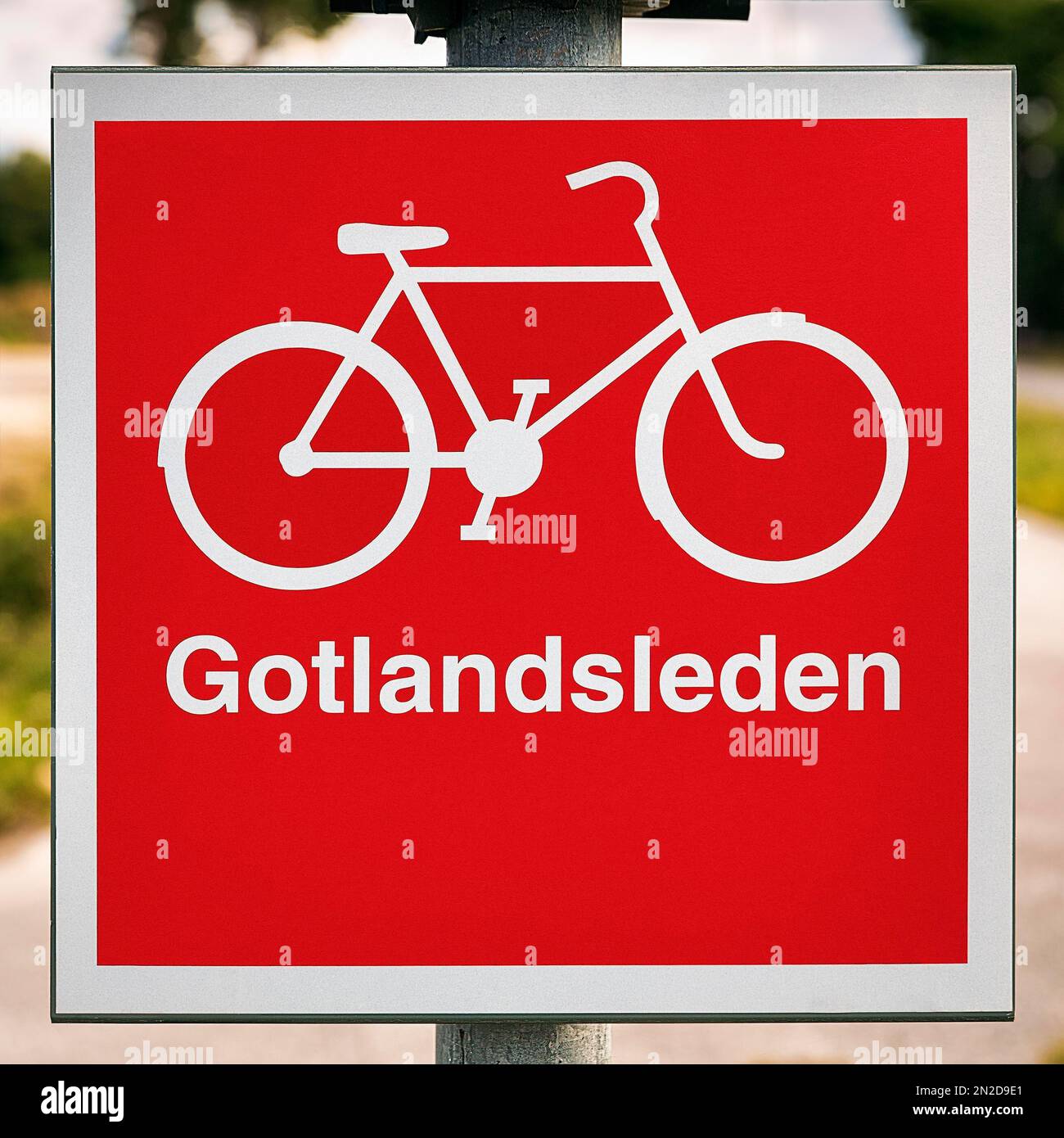 Red traffic sign with pictogram bicycle, marking for Swedish cycle path