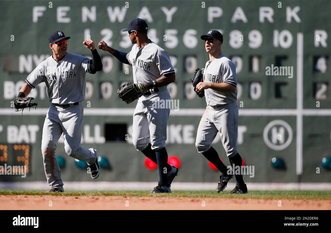 New York Yankees outfielders, from left, Jacoby Ellsbury, Chris Young