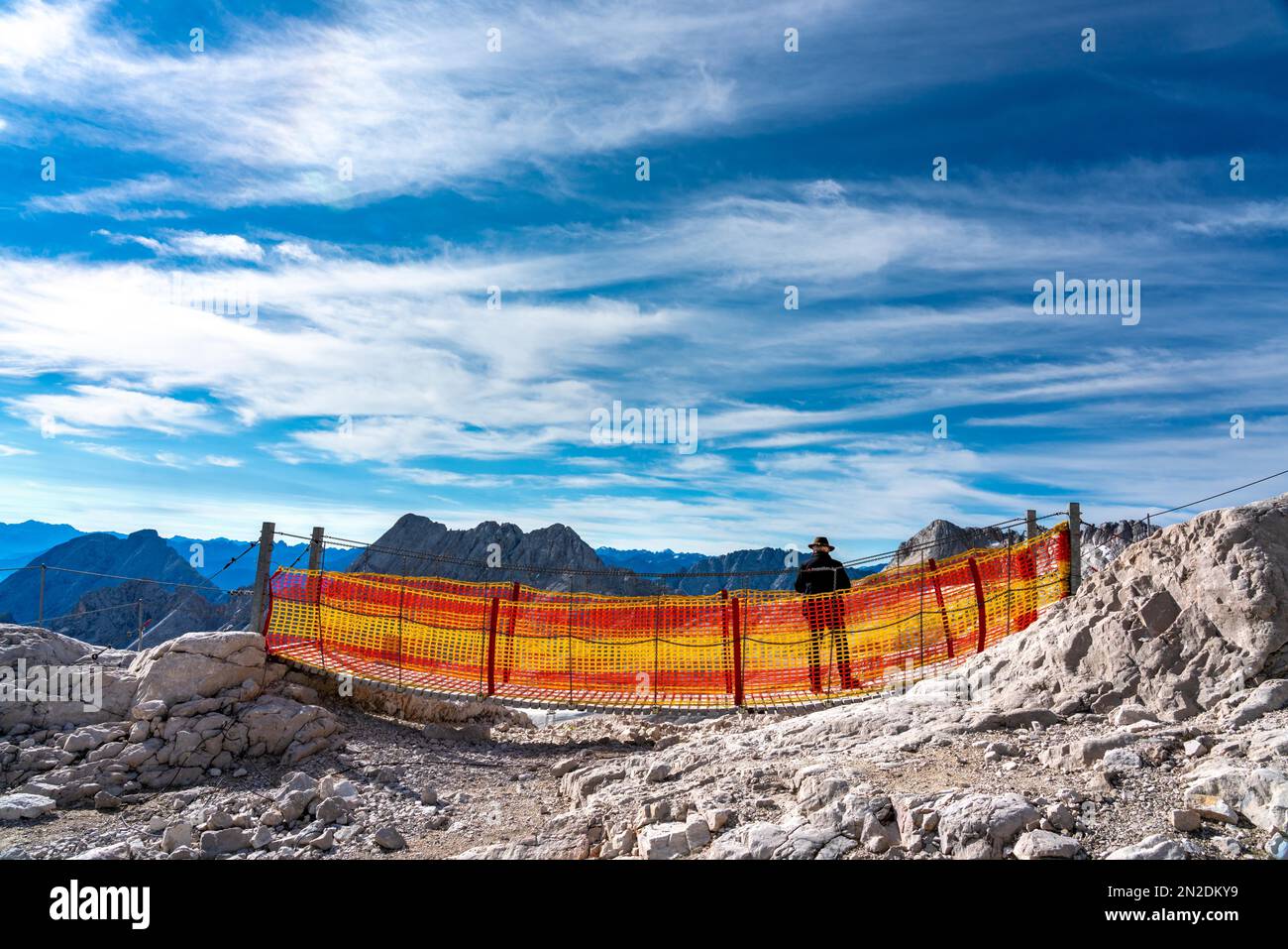 Small suspension bridge with red and yellow safety net on the Zugspitze