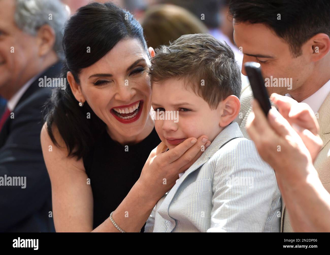 Julianna Margulies, left, and son Kieran Lieberthal, attend a ceremony