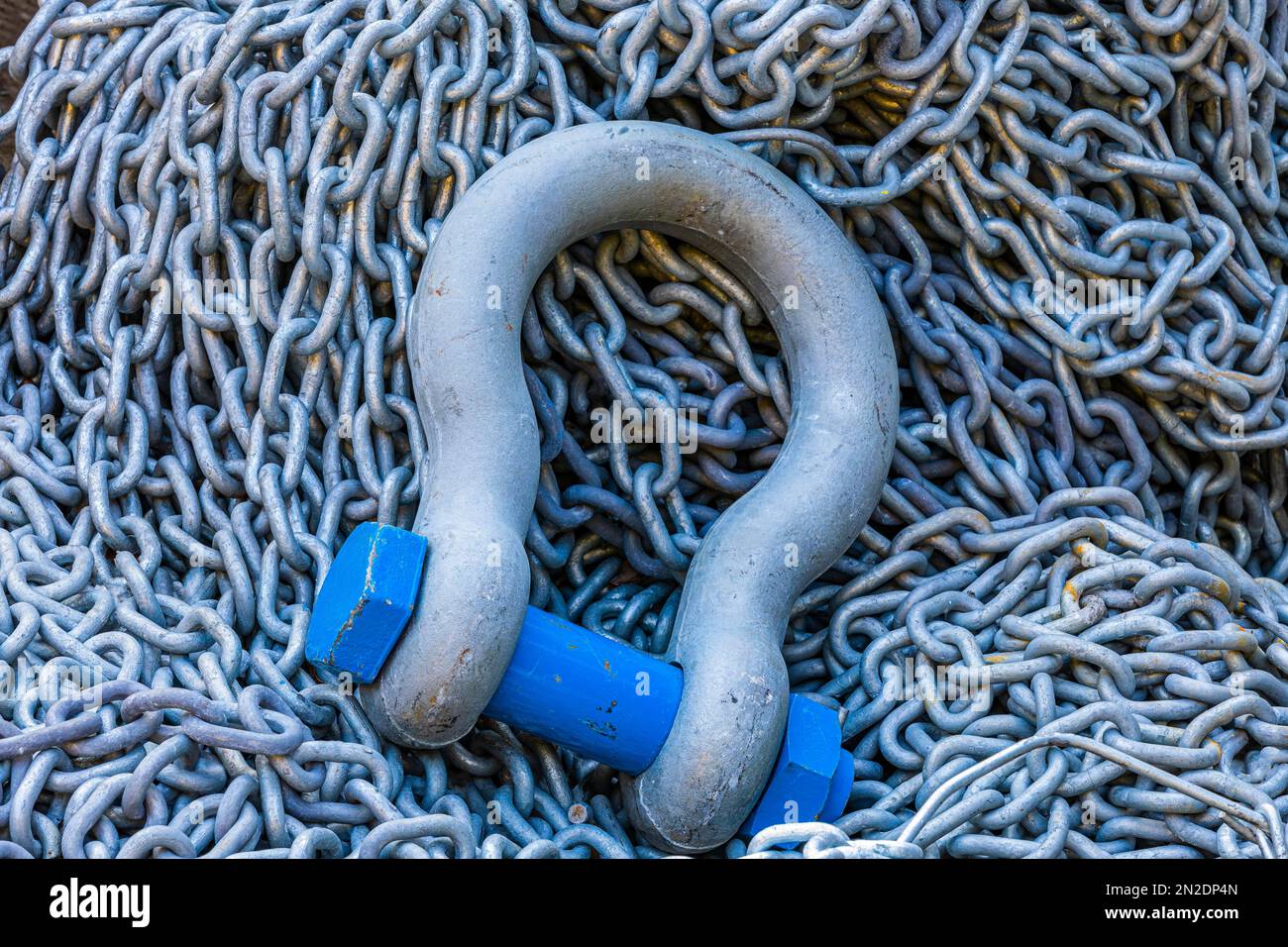 Steel eyelet with screw bolt and chain in Portofino harbour, Portofino ...