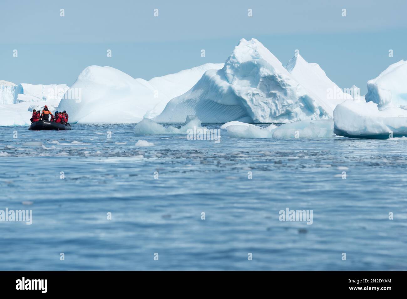 Zodiac trip around icebergs, Antarctica Stock Photo