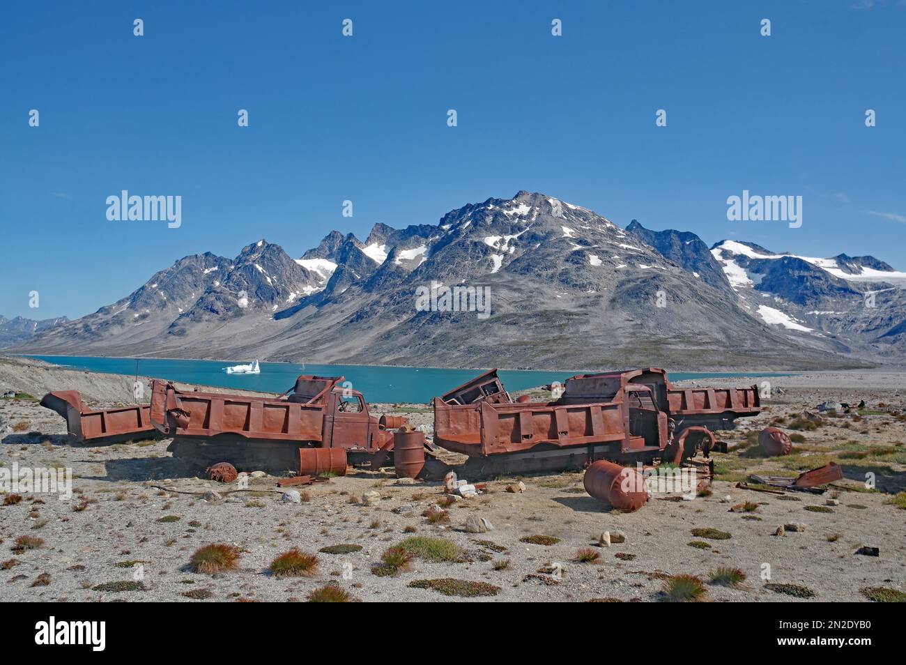 Rusty army trucks from 1947, barren mountains, Ikateq 2, army base, East Greenland, Arctic, Greenland, North America, Denmark Stock Photo