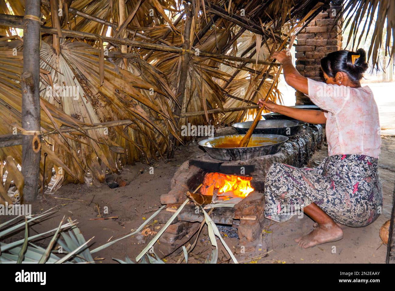 Cooking palm sugar sap, palm sugar plantation, Myanmar, Myanmar Stock