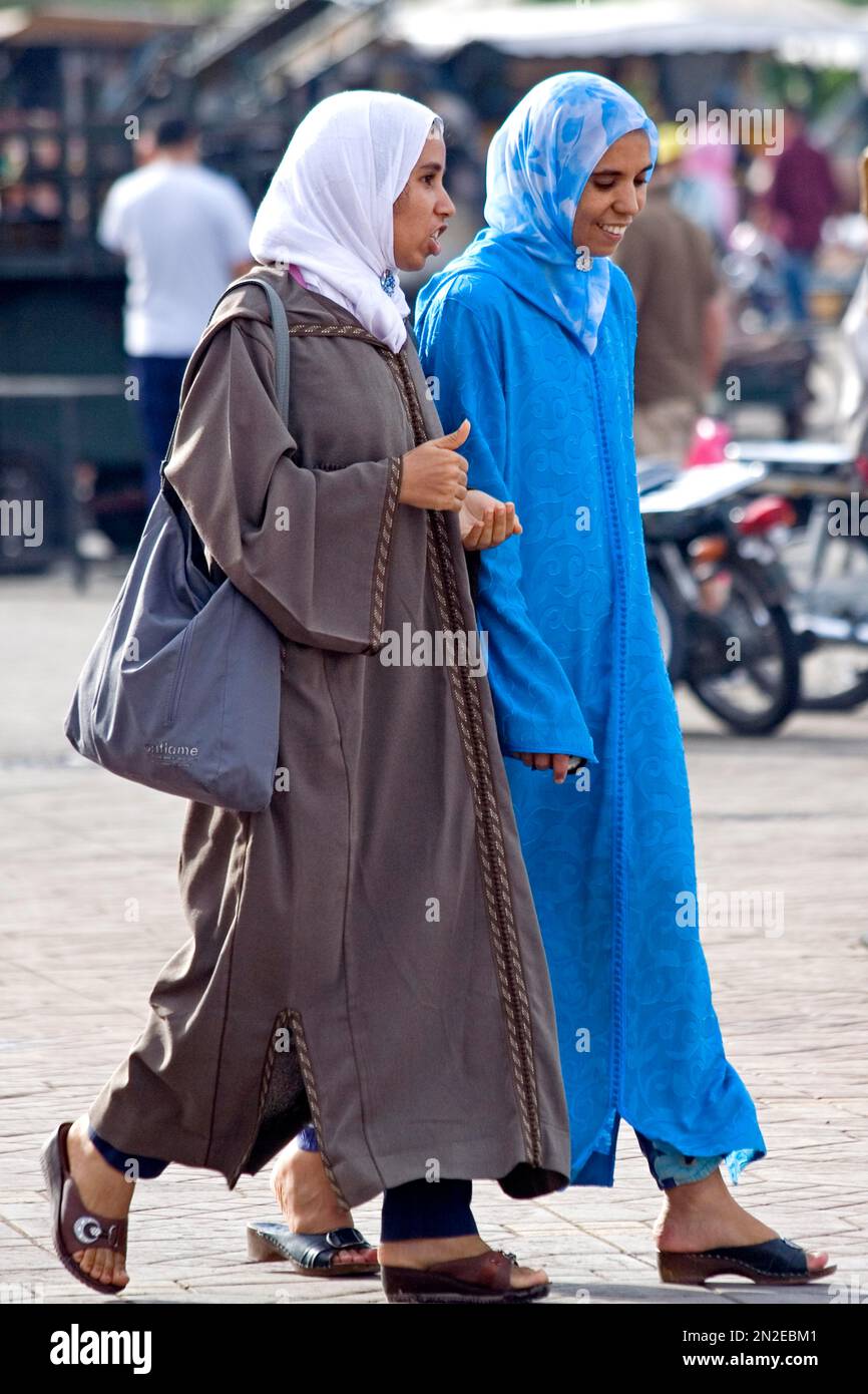 Traditionally dressed woman on the Jemaa El-Fna, Marrakech, Morocco Stock Photo