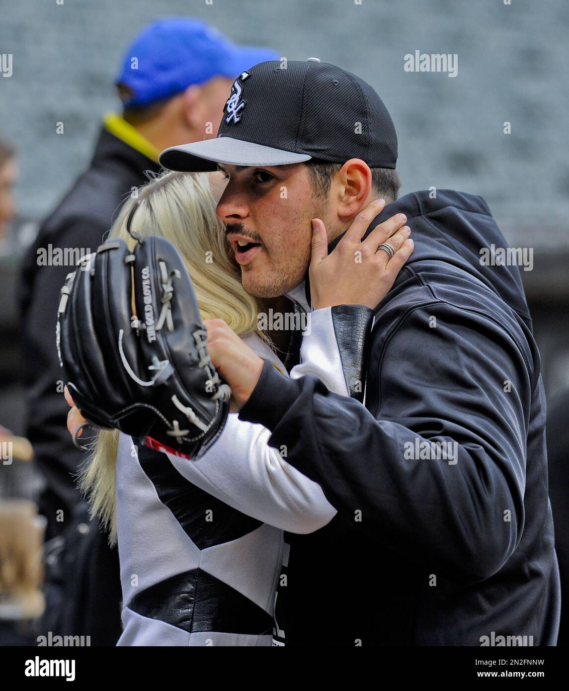 Chicago White Sox rookie pitcher Carlos Rodon hugs his girlfriend Ashley  Paddock before a baseball game against the Cleveland Indians on Monday, May  20, 2015, in Chicago. (AP Photo/Matt Marton Stock Photo 
