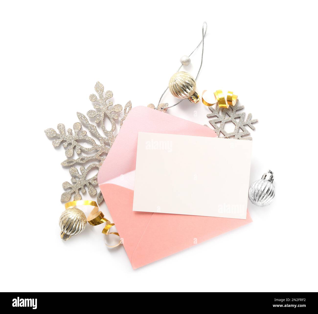 Blank greeting card and Christmas decor on white background, top view. Space for text Stock Photo