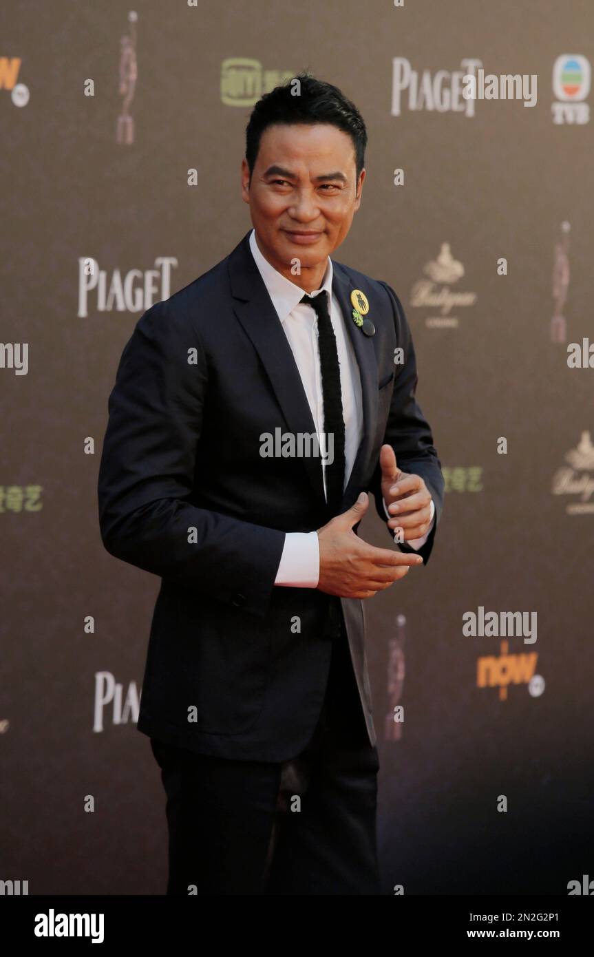 Hong Kong actor Simon Yam poses on the red carpet of the Hong Kong Film ...