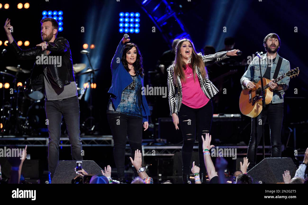 Singer Brandy Clark, second from left, performs with, left to right