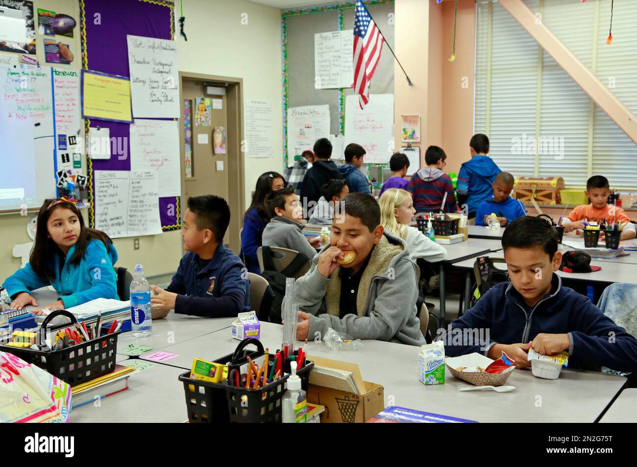 In this Wednesday, April 8, 2015 photo, students are served breakfast