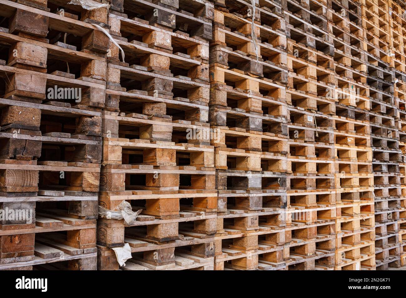 Wall made of stacked Euro pallets Stock Photo
