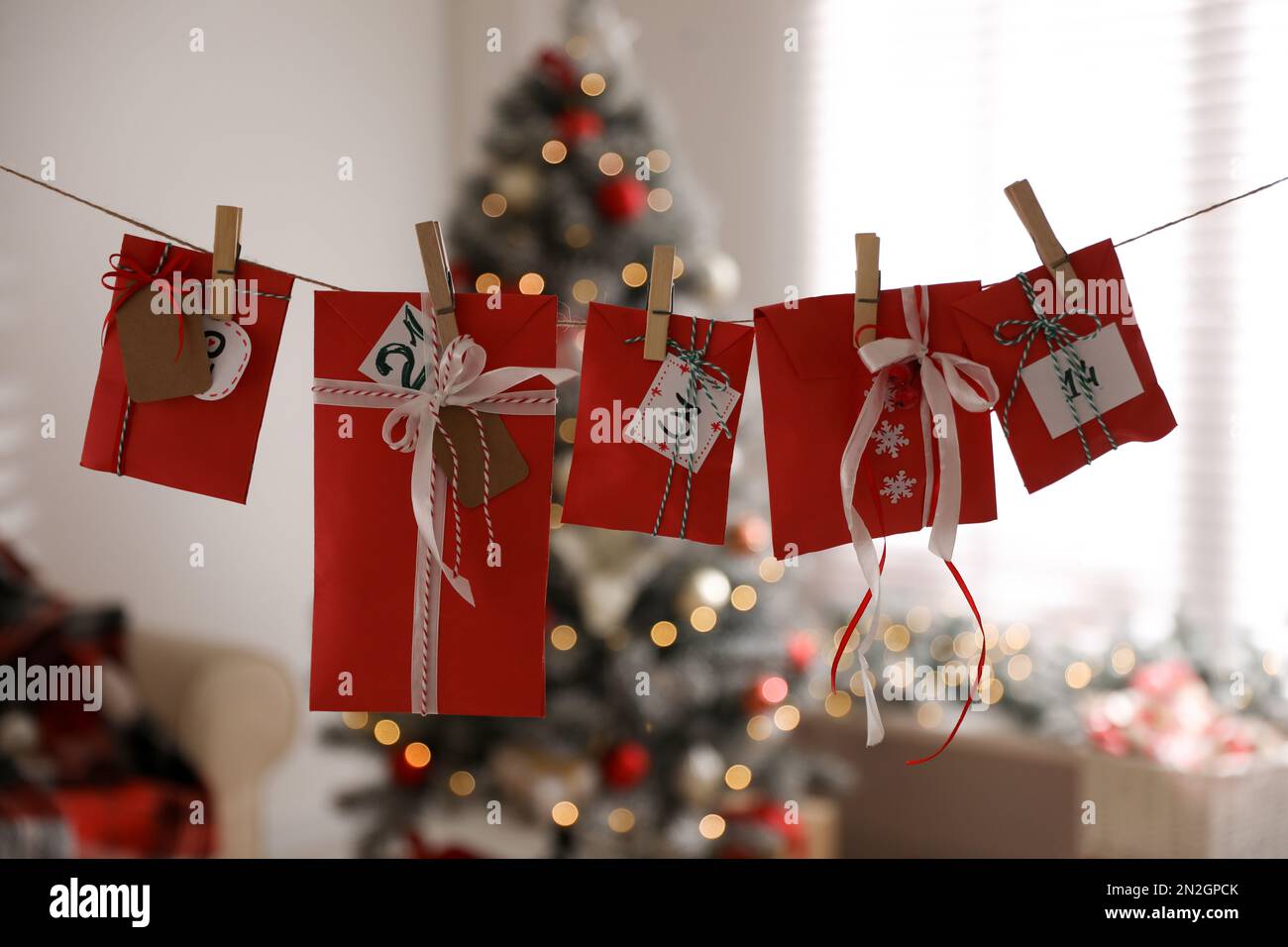 christmas-advent-calendar-with-gifts-hanging-in-room-stock-photo-alamy