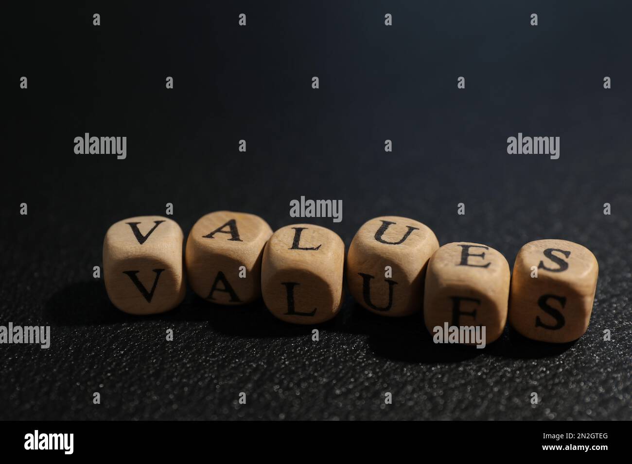 Beads with word VALUES on black background Stock Photo