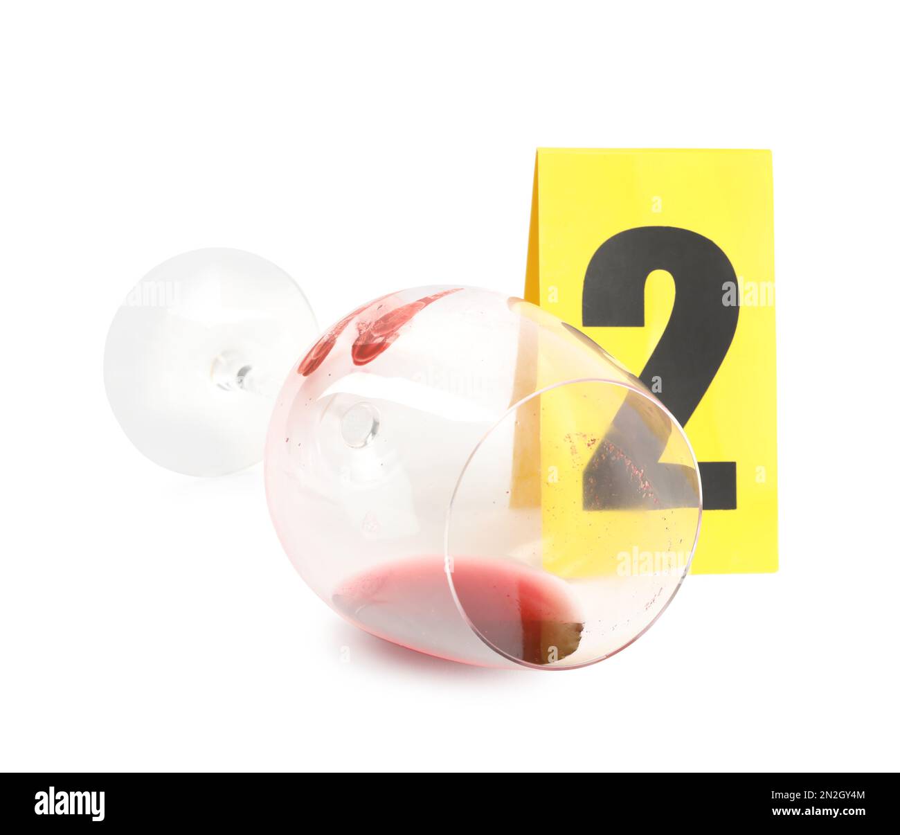 Wine glass with fingerprints and crime scene marker with number two ...