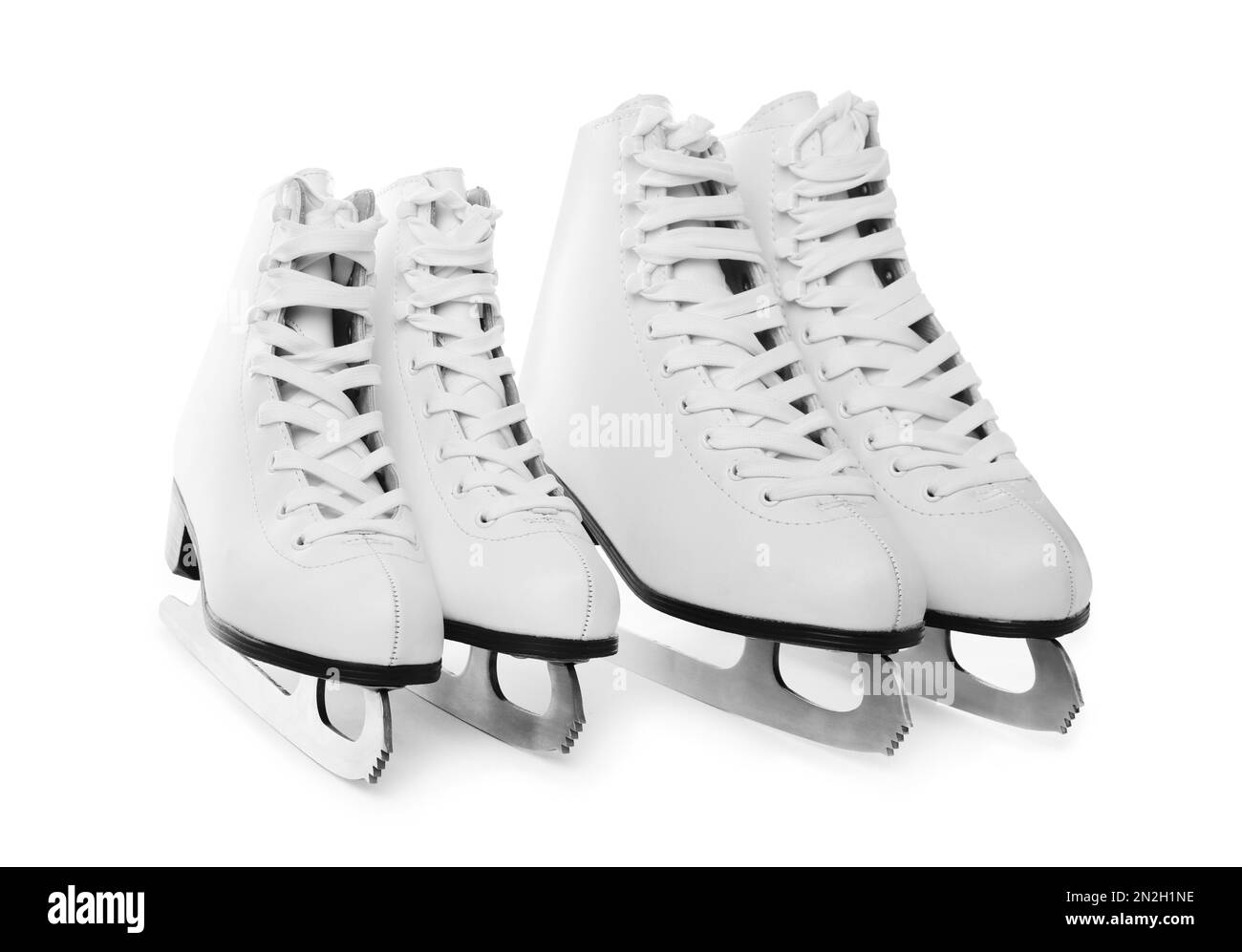 Pairs of figure ice skates isolated on white Stock Photo