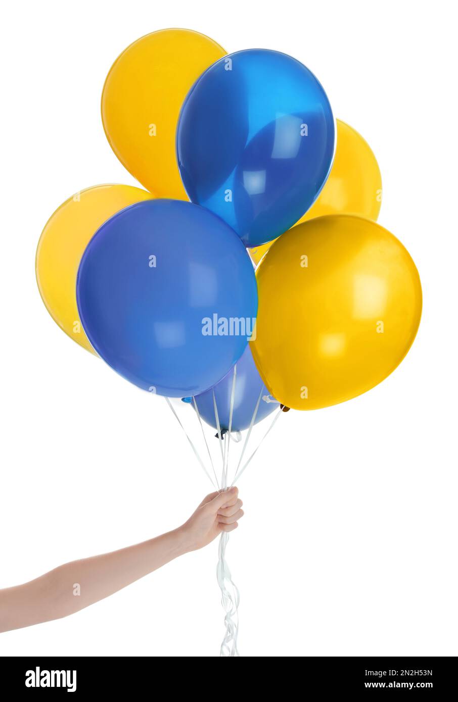 Woman holding many balloons in colors of Ukrainian flag on white background, closeup Stock Photo