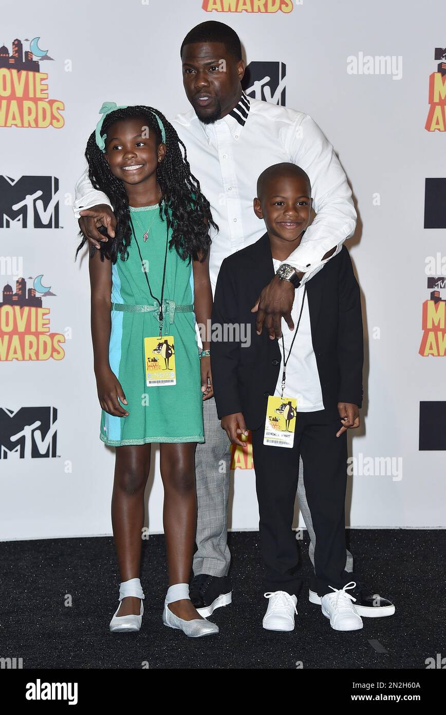 Kevin Hart, winner of the comedic genius award, poses in the press room