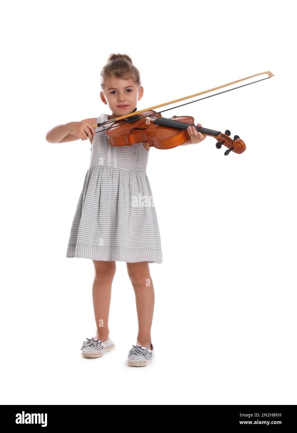 Little girl playing violin on white background Stock Photo - Alamy