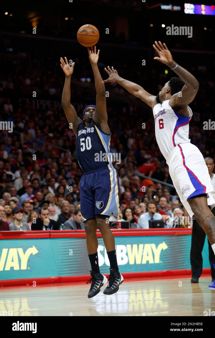 Memphis Grizzlies' Zach Randolph shoots while Los Angeles Clippers' DeAndre  Jordan defends during the second half of an NBA basketball game, Saturday,  April 11, 2015, in Los Angeles. (AP Photo/Danny Moloshok Stock