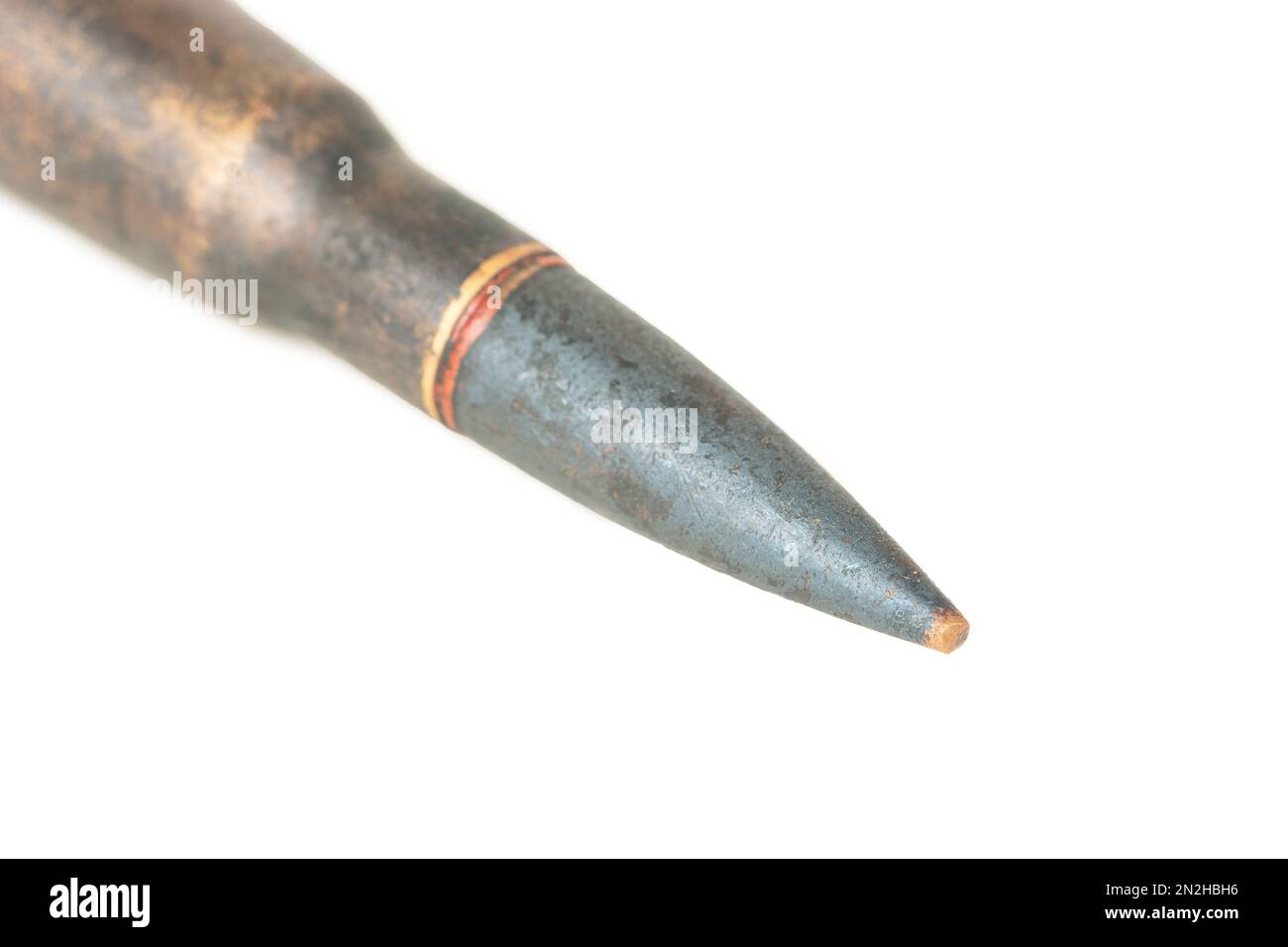 Bullet of a Kalashnikov assault rifle close-up on a white background Stock Photo