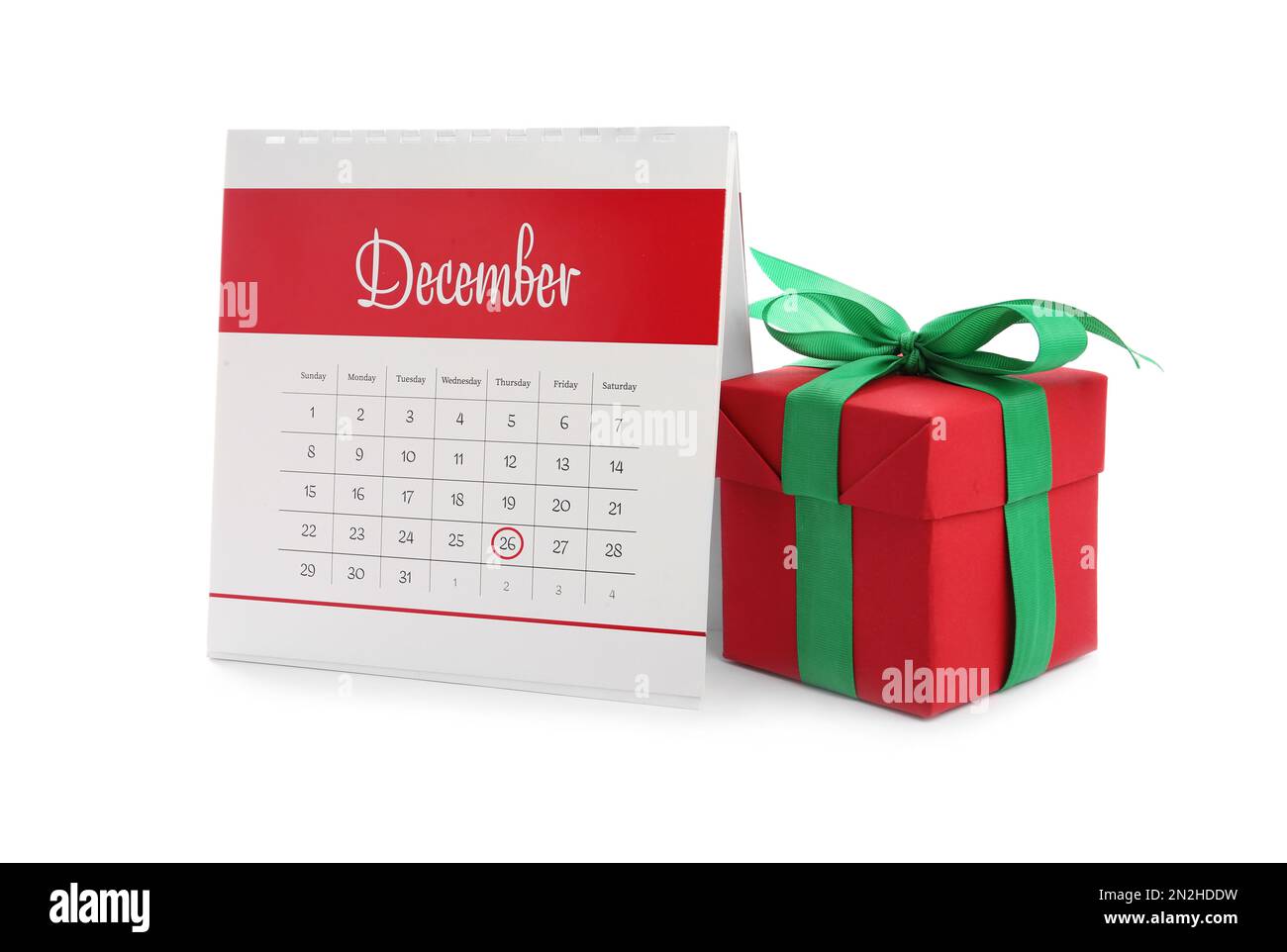 Calendar with marked Boxing Day date and gift on white background Stock Photo