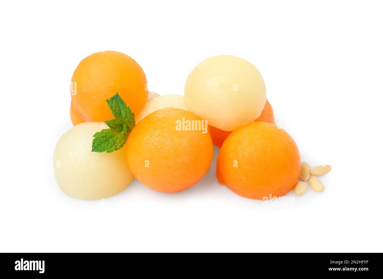 Different melon balls with mint on white background Stock Photo Alamy