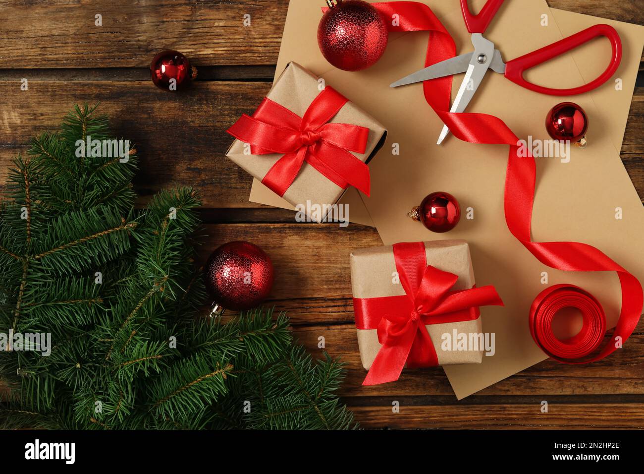 Flat lay composition with Christmas gift boxes and decor on wooden ...