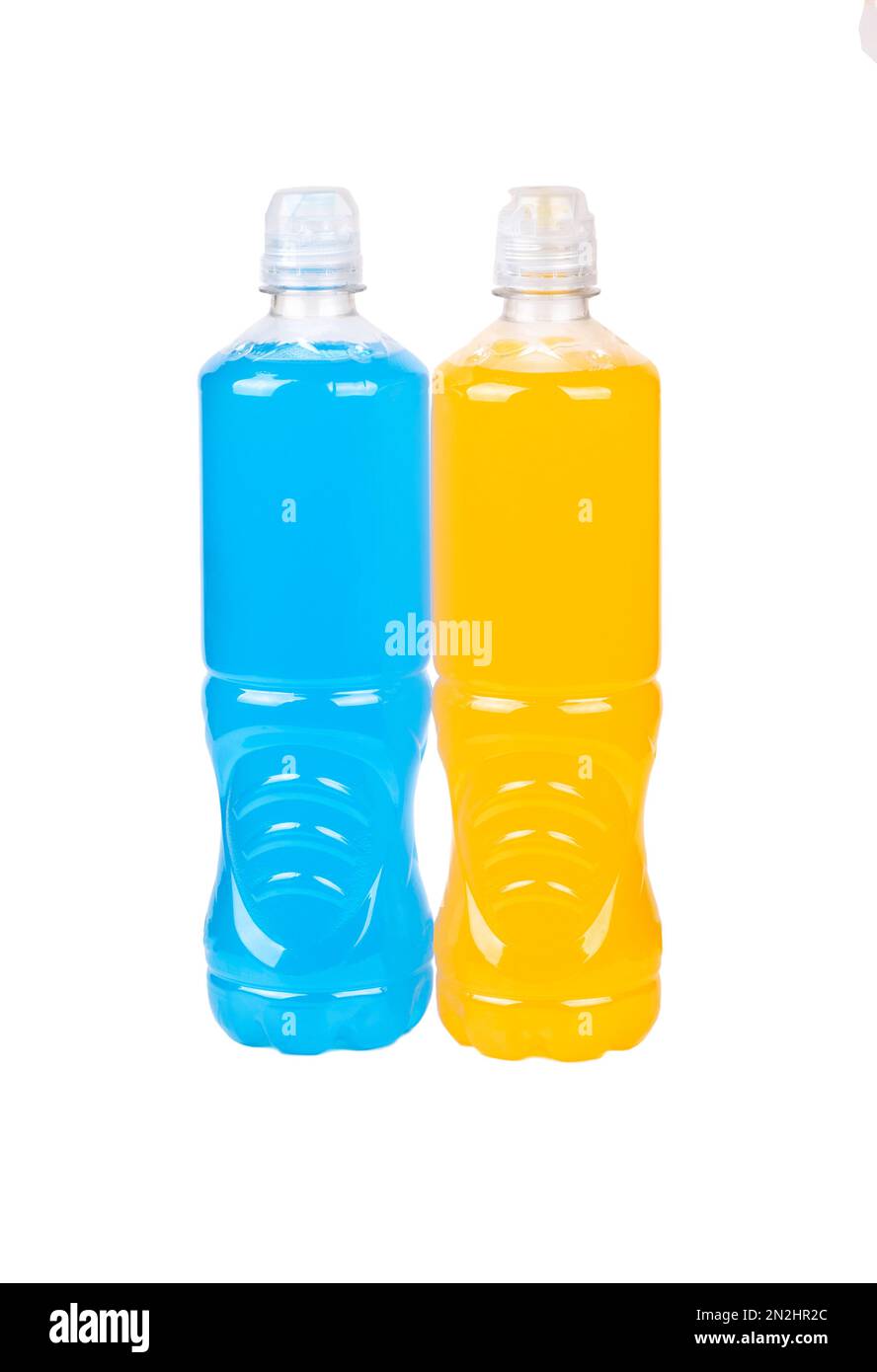 Isotonic drink for sports blue and orange in plastic bottles isolated on white background. Stock Photo