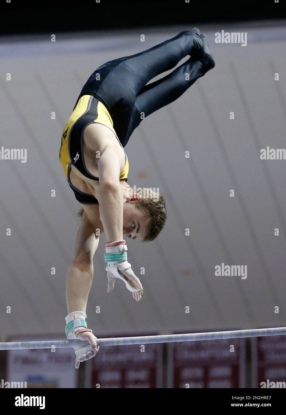 Army's Nathan Goff competes on the high bar during the preliminary