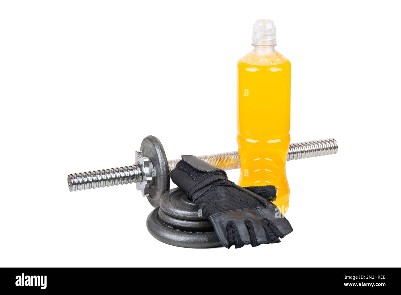 Bottle of orange isotonic drink with dumbbell, gloves and pancakes isolated on white background. Stock Photo