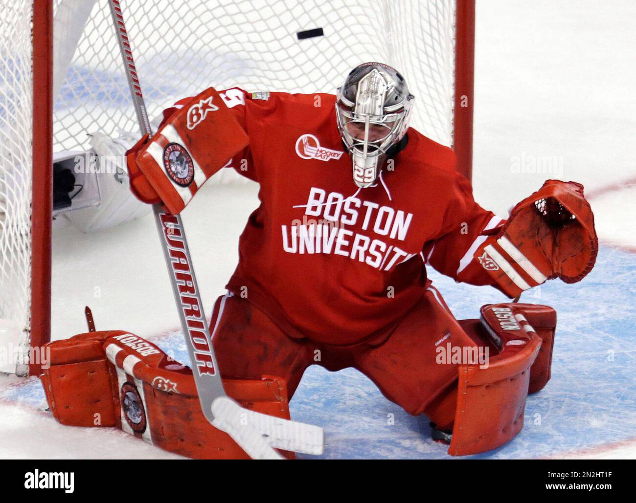 Boston University goalie Matt O'Connor deflects the puck on a save