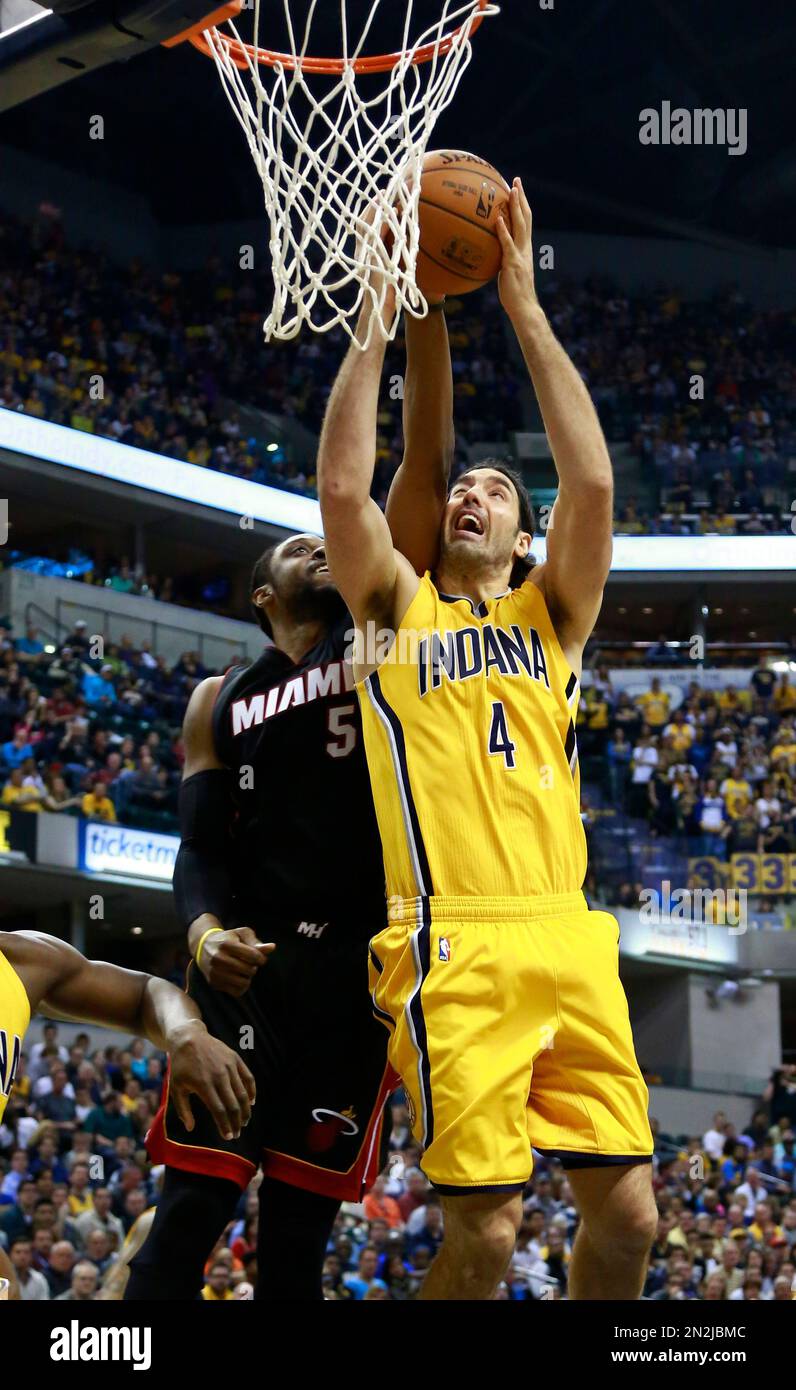 Indiana Pacers forward Luis Scola (4) shoots as Miami Heat forward