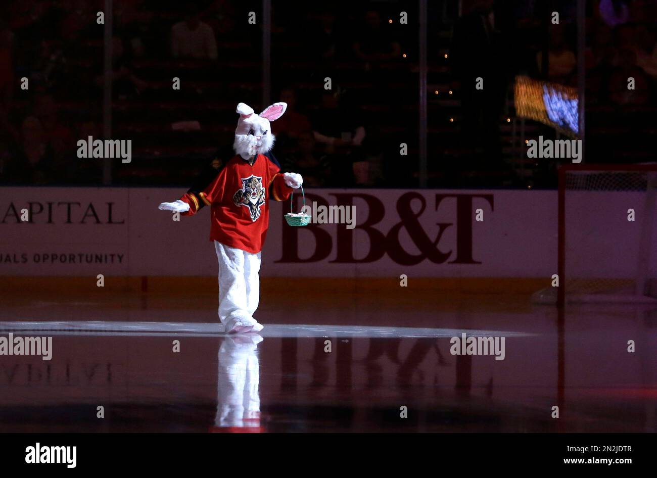 The Easter Bunny skates before the start of an NHL hockey game between