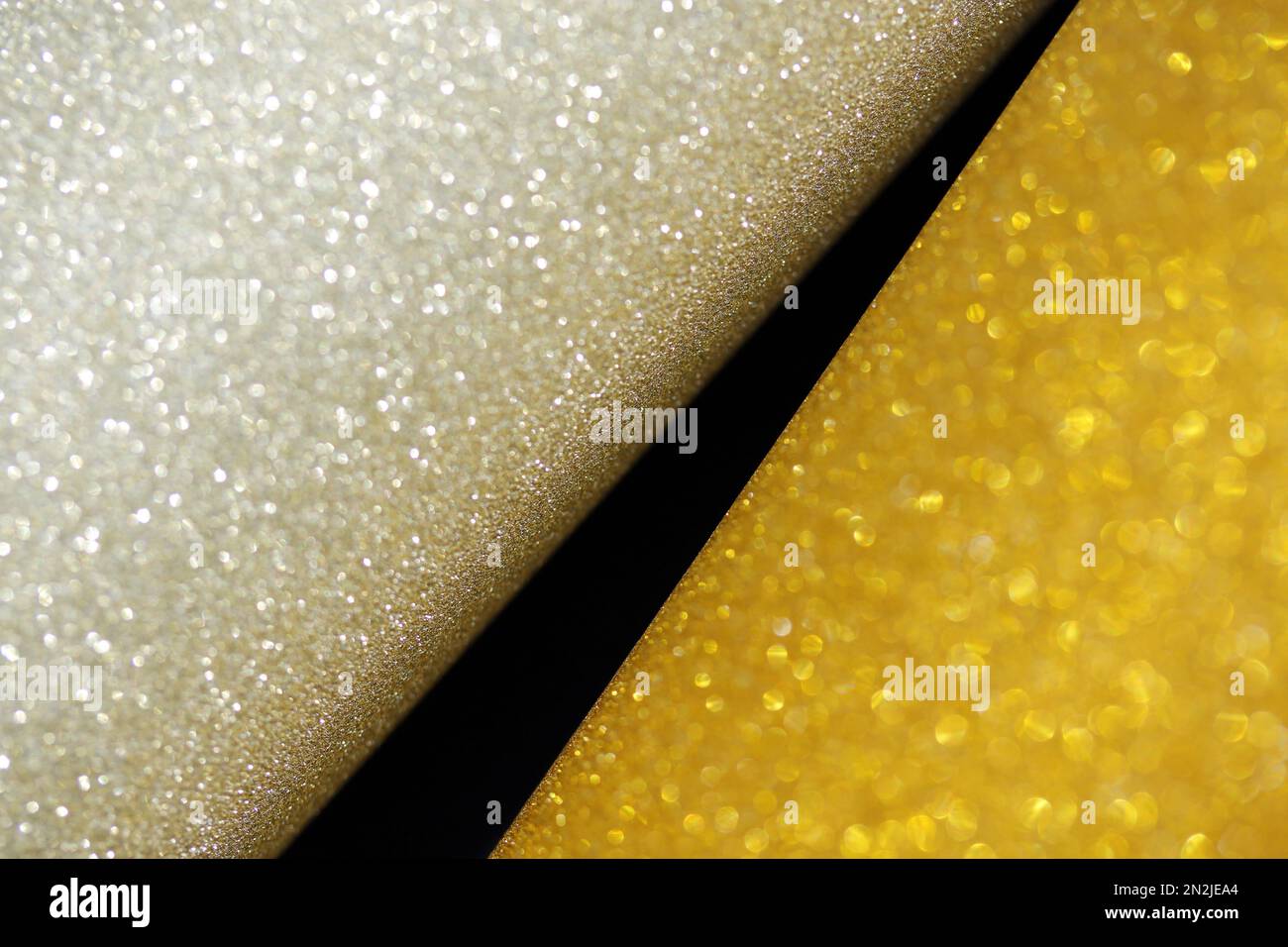 gold silver glitter paper abstract, sparkle lights and bokeh, natural grunge texture background Stock Photo