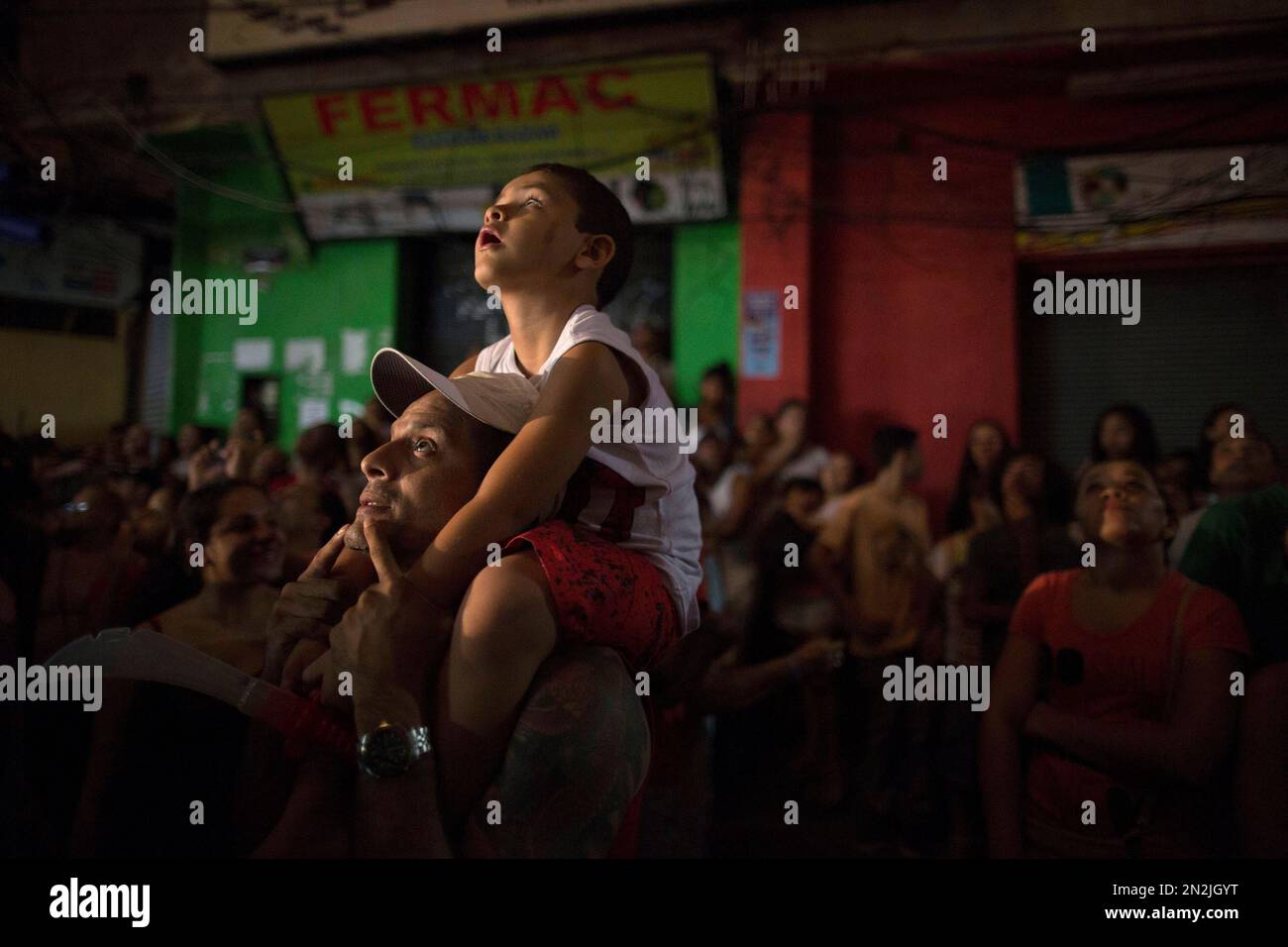 Residents watch the Passion of Christ on Good Friday during Holy Week ...