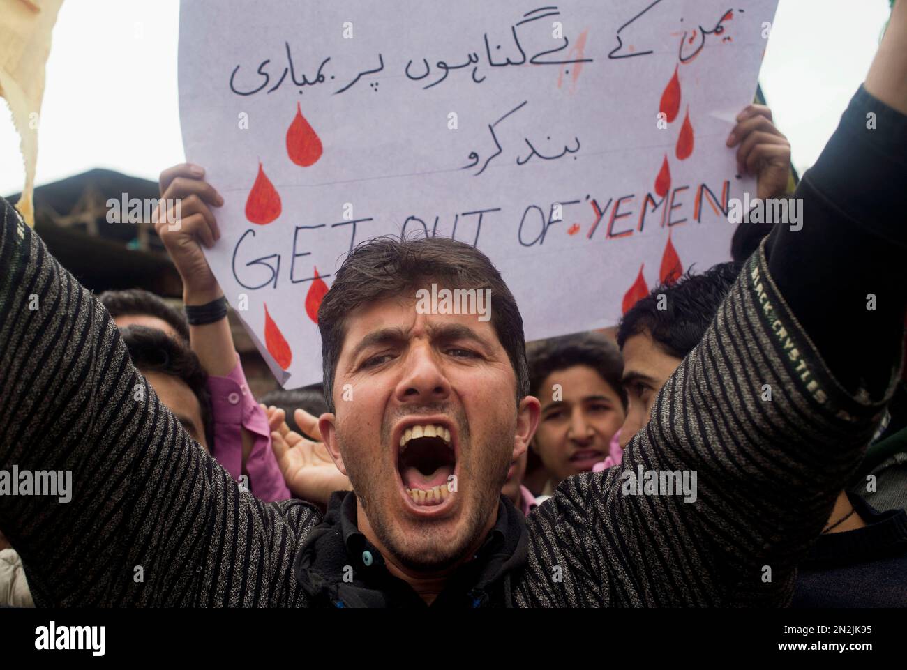 A Kashmiri Shia Muslim protester shouts slogans against Saudi-led ...