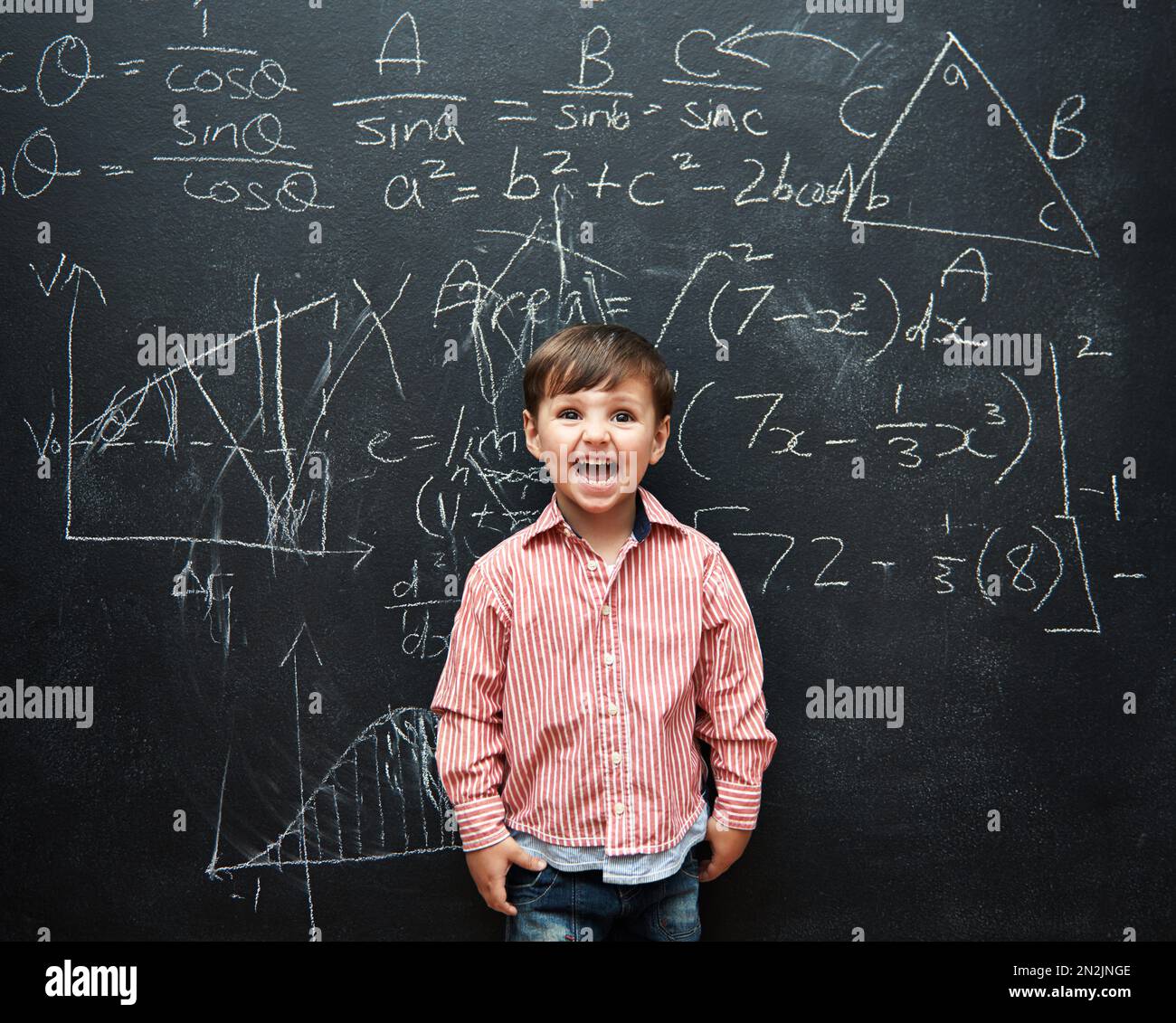 Yes More math. a young boy with a blackboard full of math equations