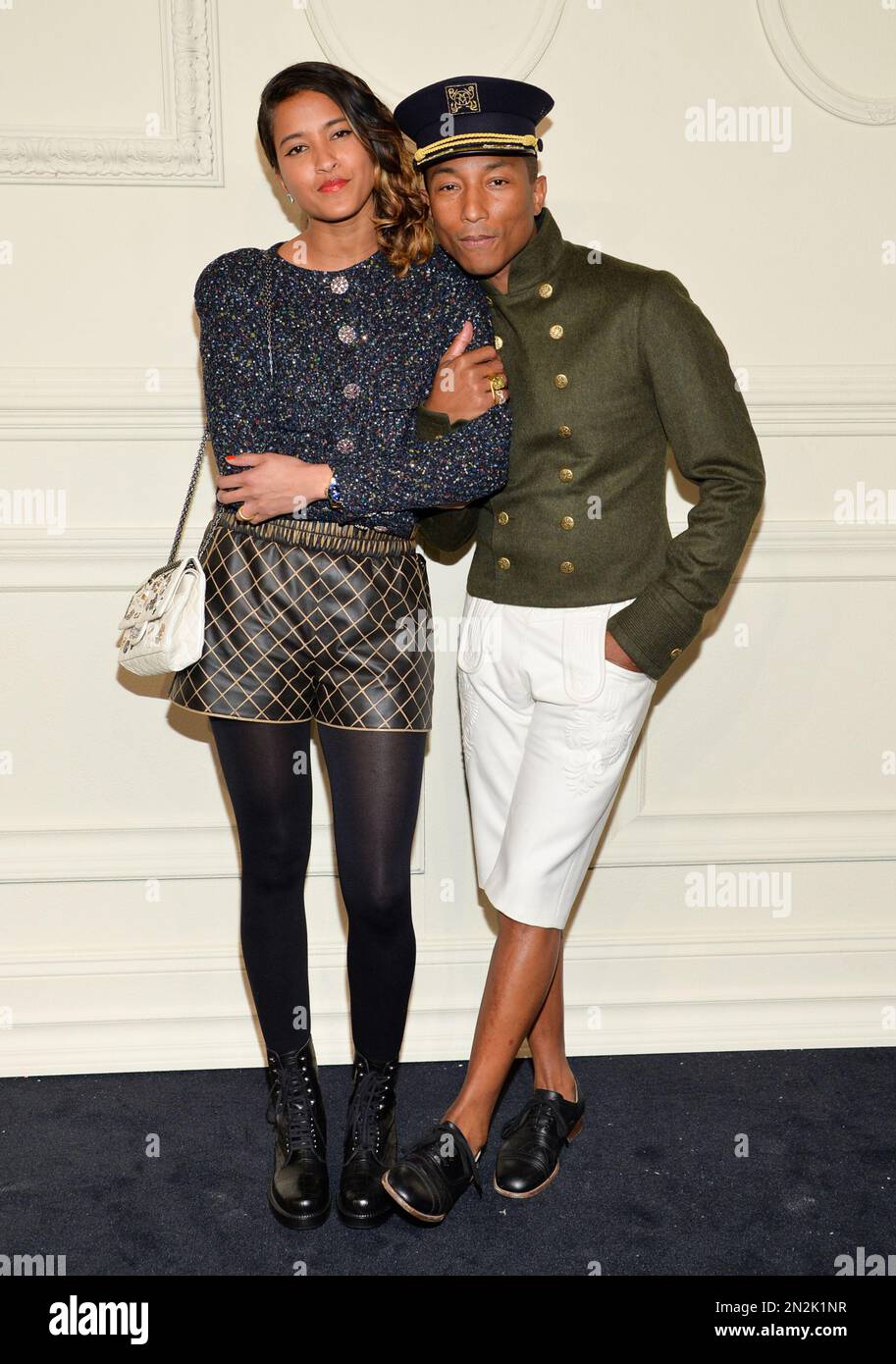 Pharrell Williams and wife Helen Lasichanh arrive at the CHANEL  Paris-Salzburg 2014/15 Metiers d'Art Collection fashion show at the Park  Avenue Armory on Tuesday, March 31, 2015, in New York. (Photo by