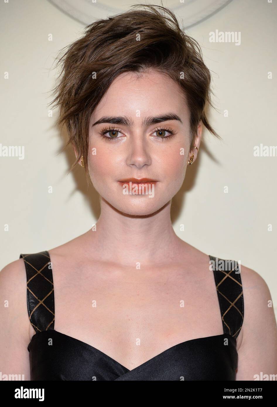 Actress Lily Collins Arrives At The CHANEL Paris Salzburg 2014 15 actress-lily-collins-arrives-at-the-chanel-paris-salzburg-2014-15