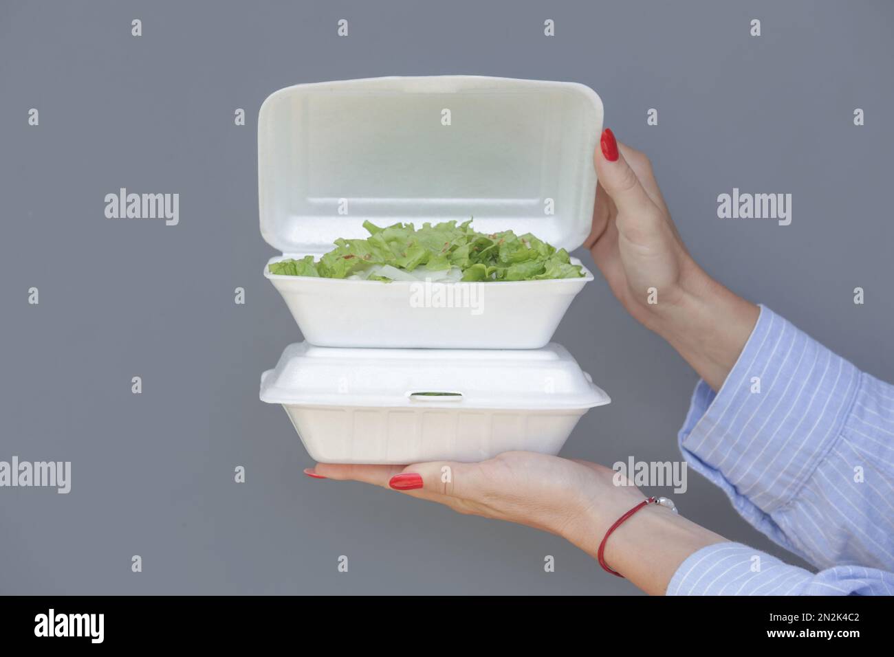 Healthy Greek Salad In Plastic Package For Take Away Or Food Delivery On A  White Marble Background Stock Photo - Download Image Now - iStock