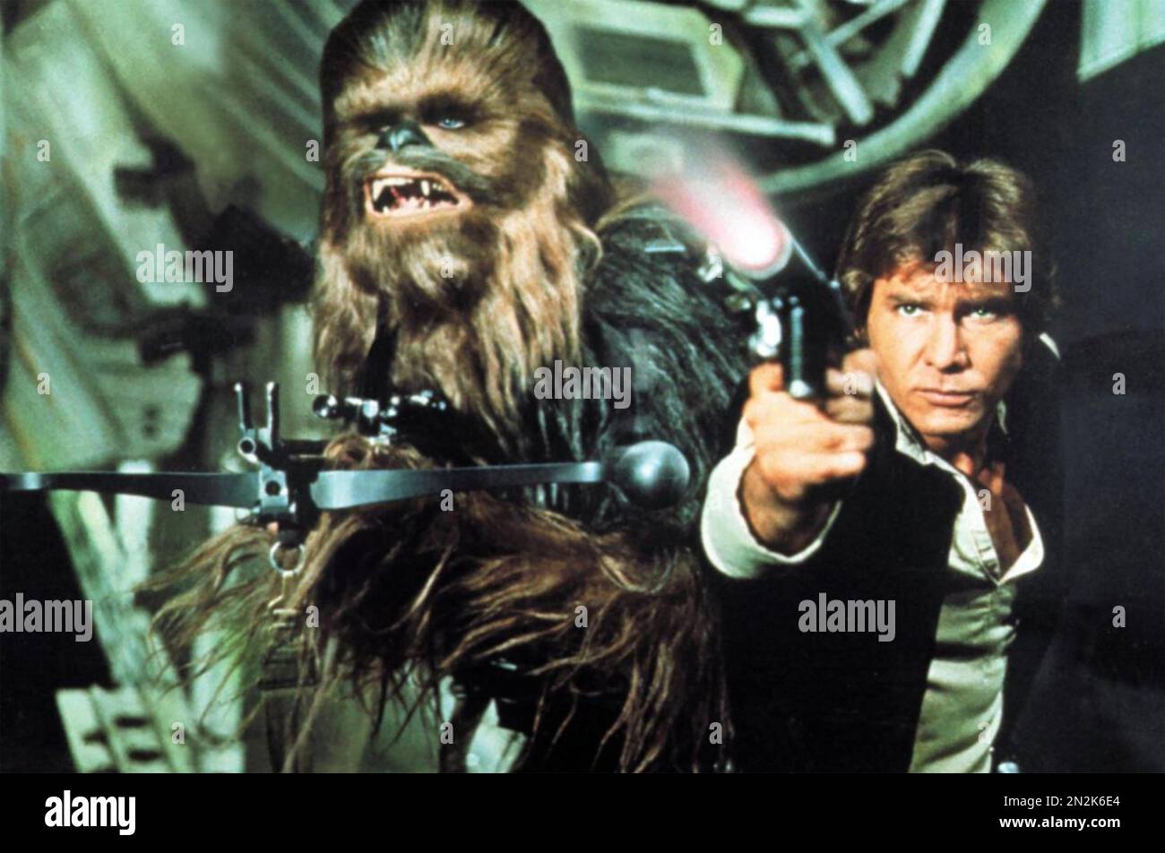 STAR WARS: EPISODE IV - A NEW HOPE 1977 20th Century Fox film with  film with  Peter Mayhew as Chewbacca and Harrison Ford as Hans Solo Stock Photo