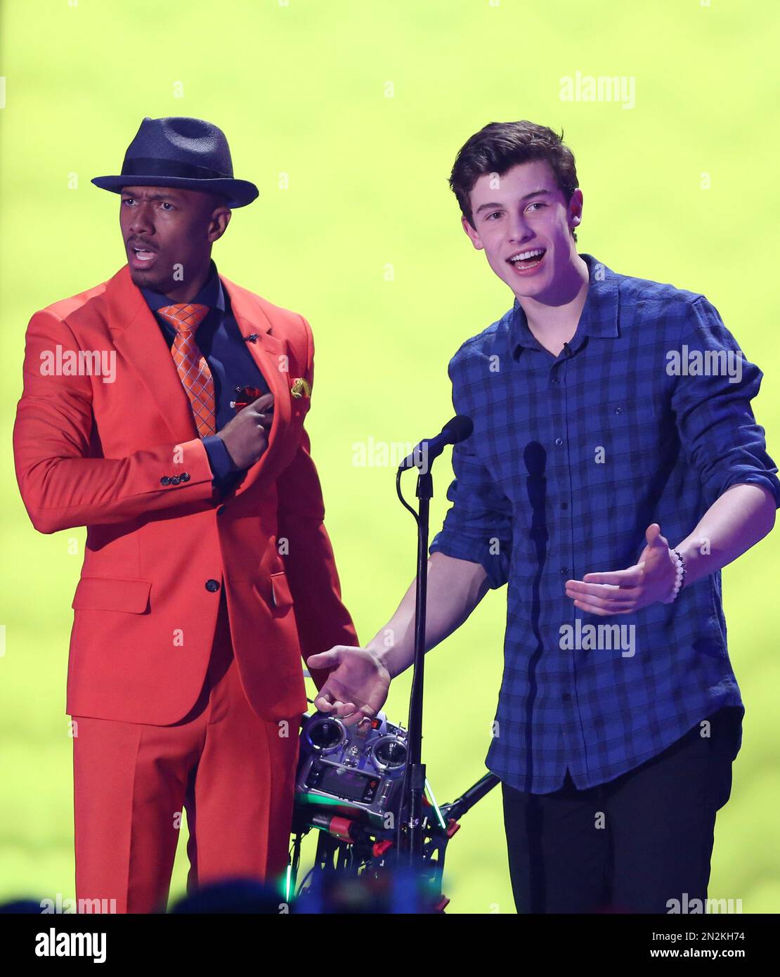 Nick Cannon and Shawn Mendes present the award for favorite cartoon at ...