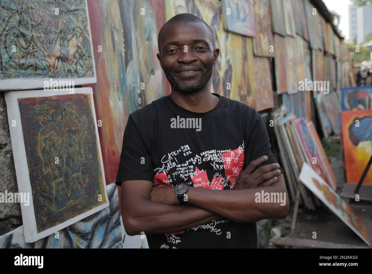Congolese artist visiting his posters in Kinshasa Stock Photo Alamy
