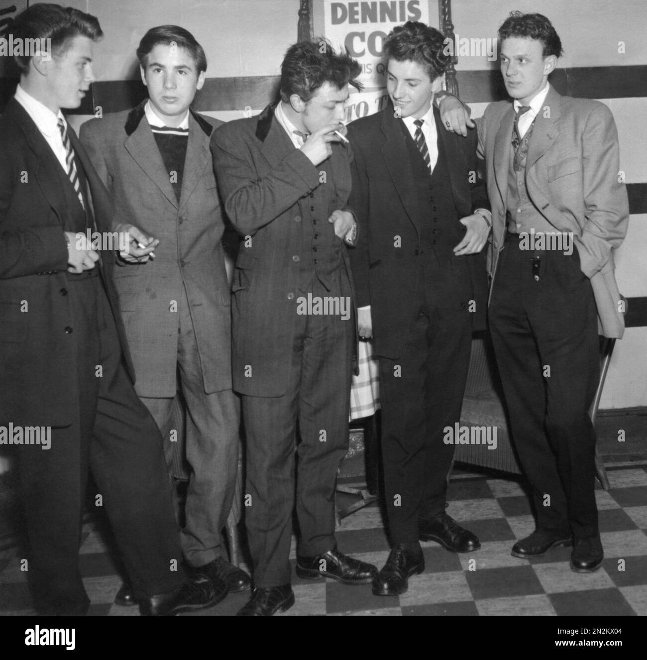 Five Teddy Boys show between dances in June 1954, in Britain. L-R ...