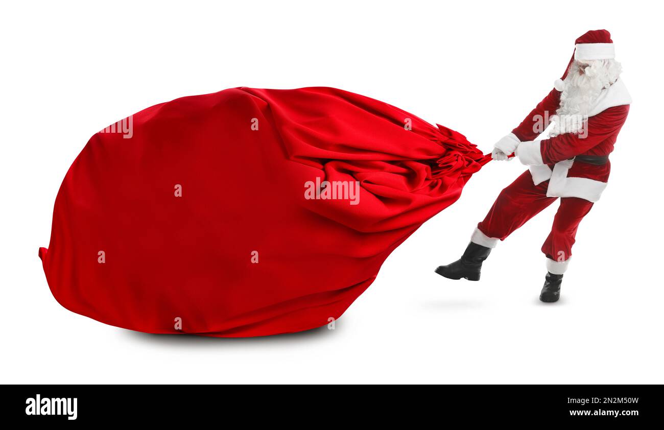 Santa Claus puling enormous red bag full of Christmas gifts on white ...