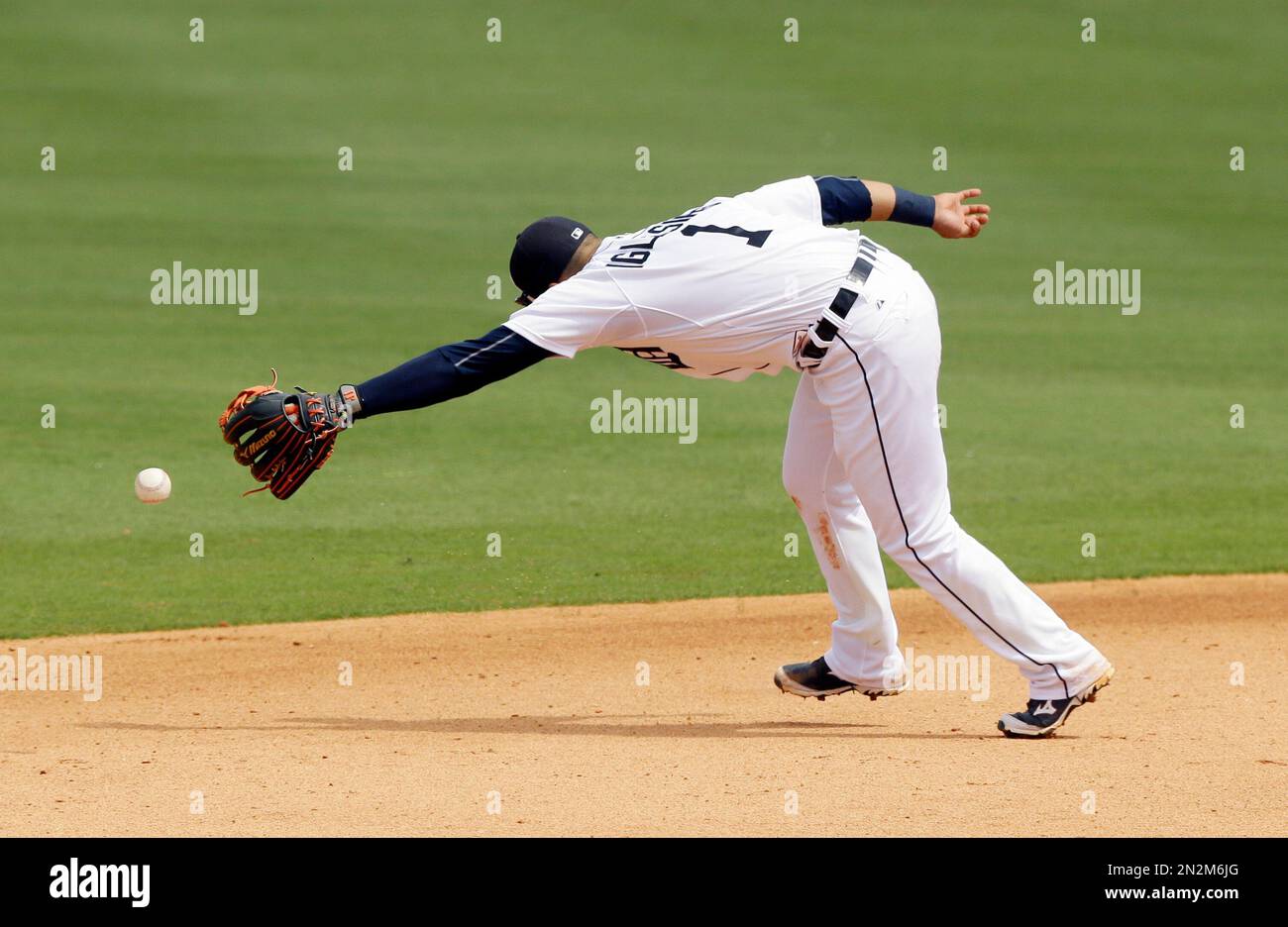 Miami Marlins shortstop Jose Iglesias throws to first during a