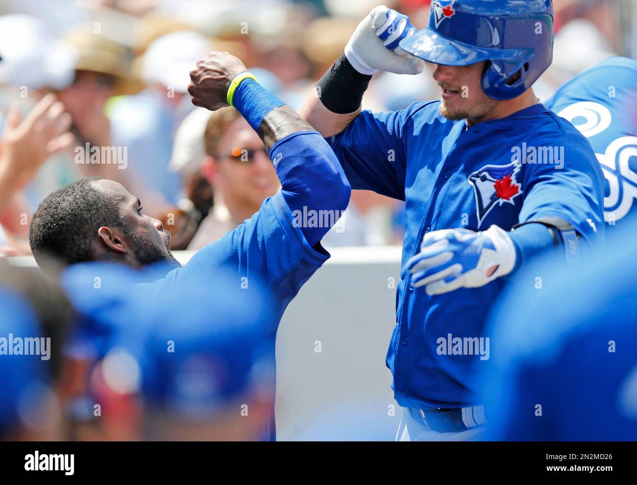 Toronto Blue Jays' Josh Donaldson, left bumps elbows with teammate Jose  Reyes, left, to celebrates after hitting a solo home run in the fifth  inning against Minnesota Twins starting pitcher Ricky Nolasco
