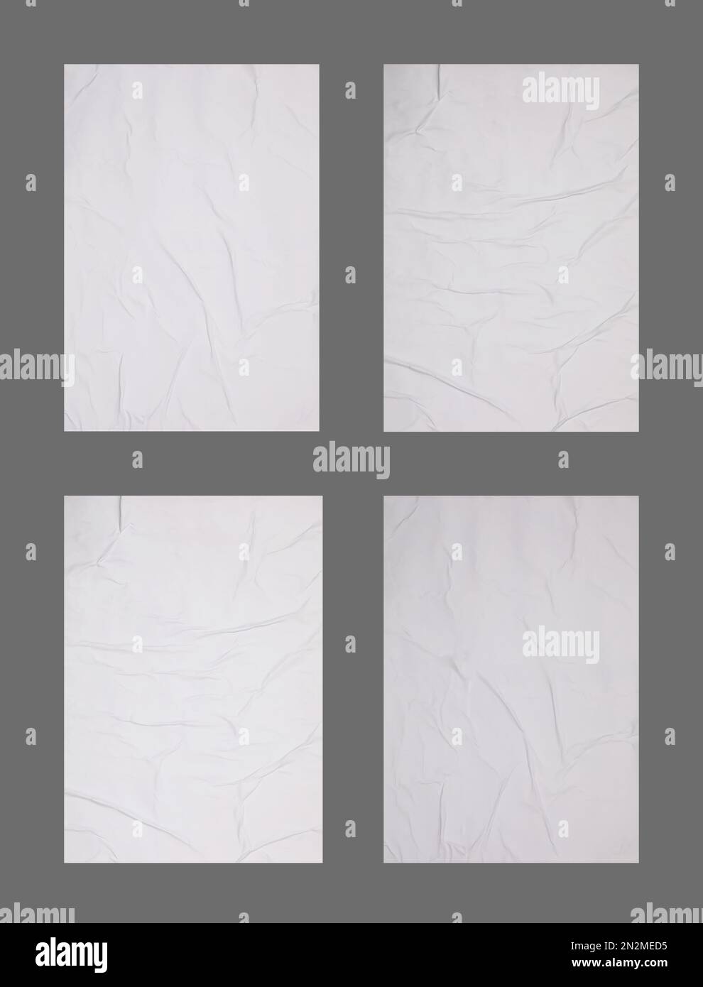 Collection of creased blank posters on grey background Stock Photo
