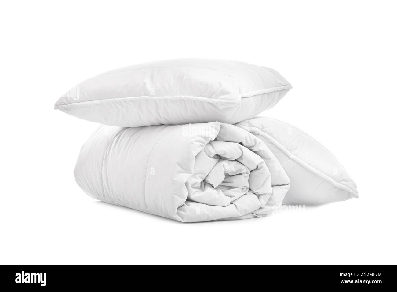 Soft blanket with pillows on white background Stock Photo Alamy